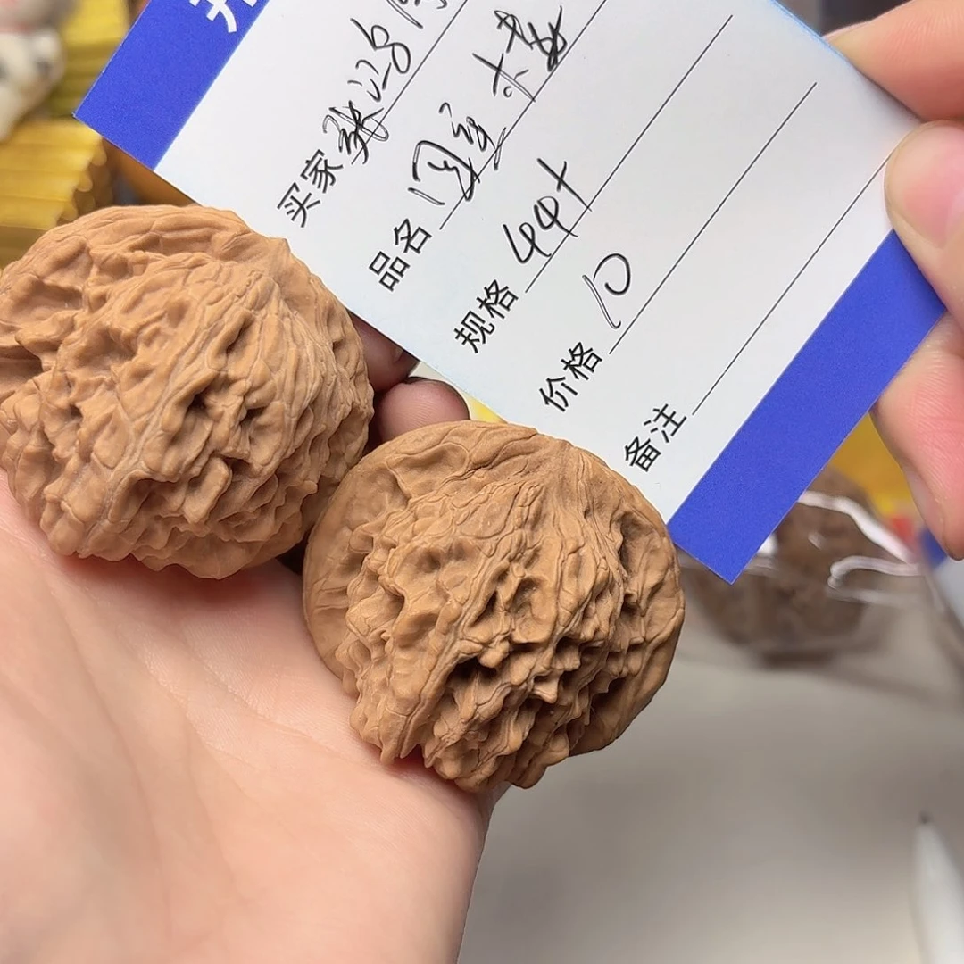 张***图文玩核桃吊坠四座楼狮子头