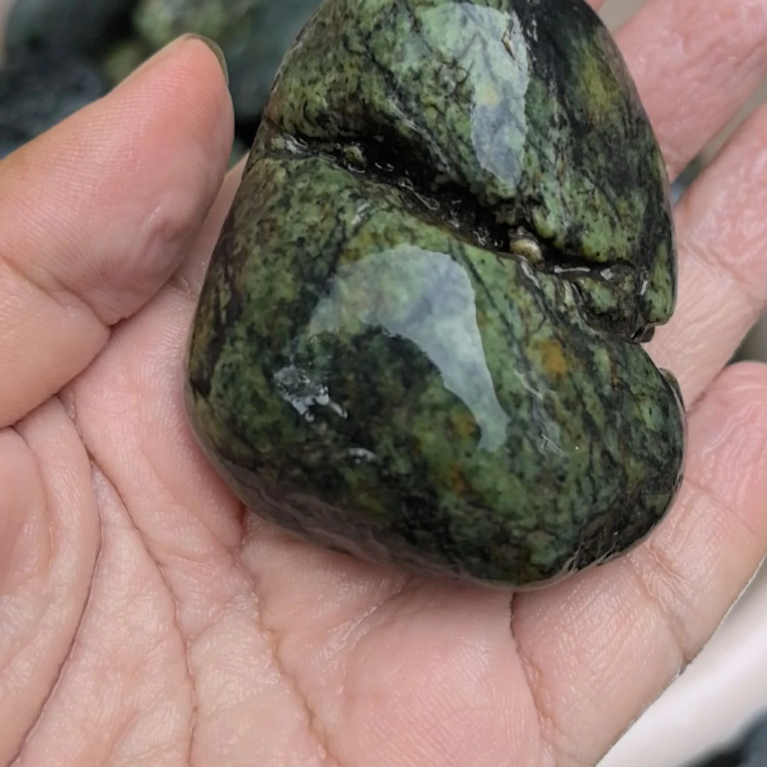 石材硫**幺藏玉药王石原石手把件一个