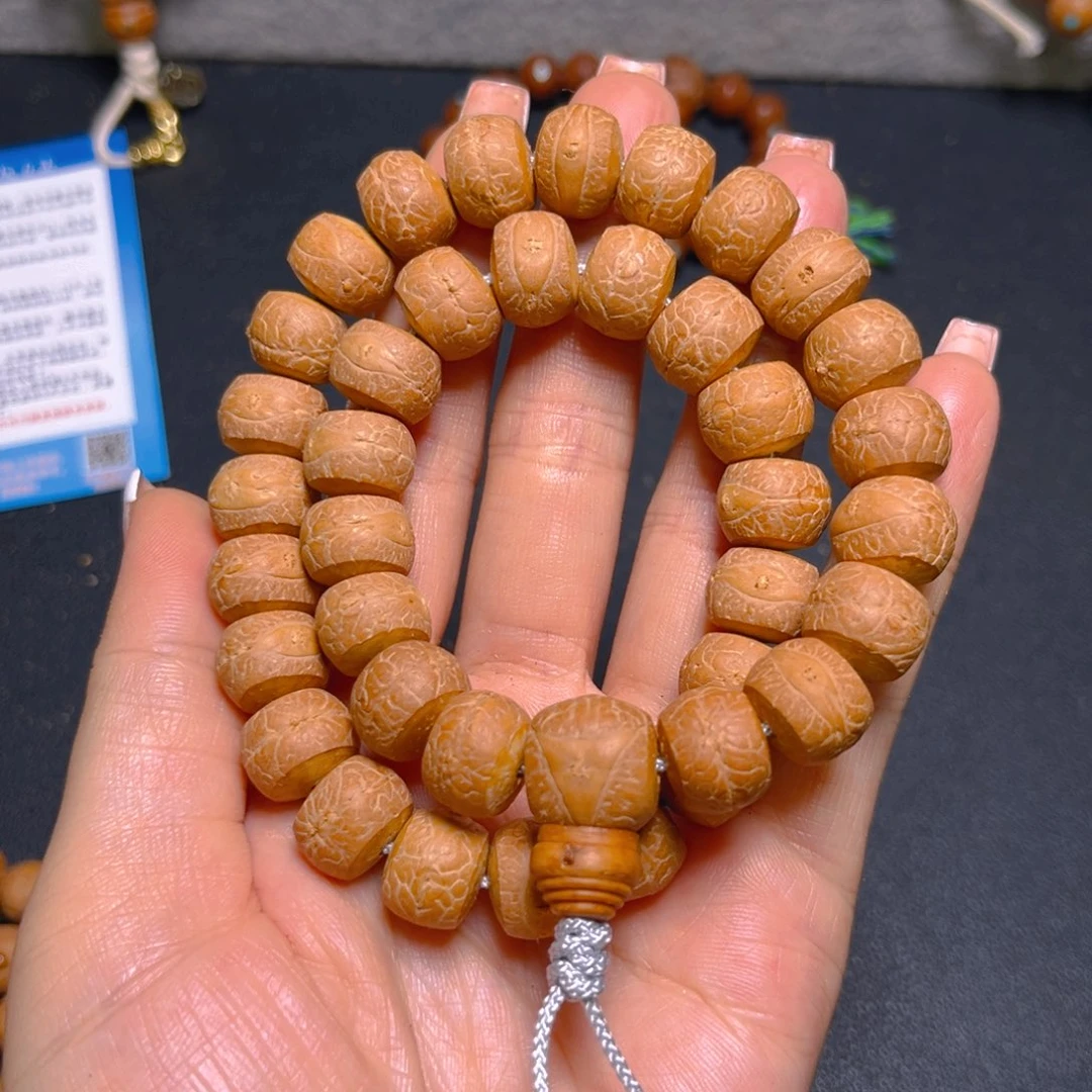 凤眼菩提吊坠13mm 36颗精工藏式手持