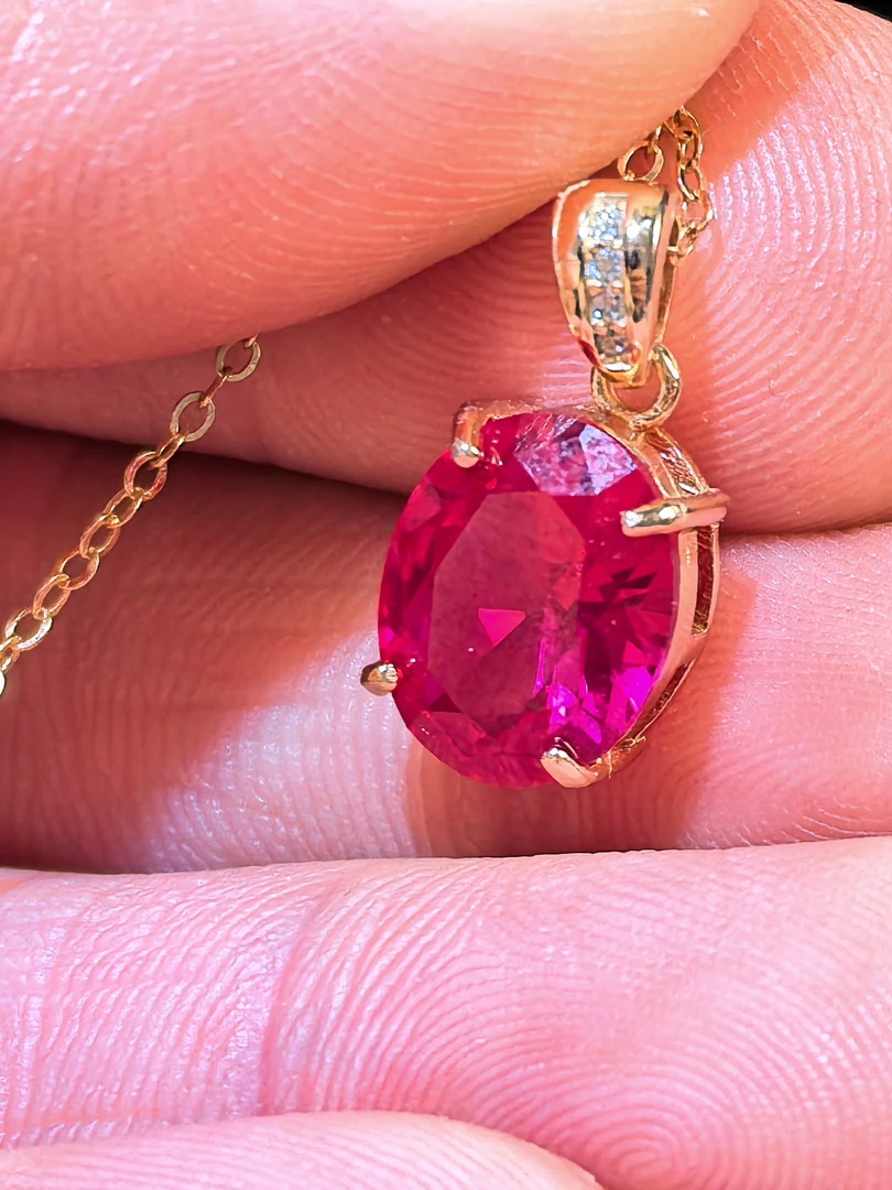 s925银镶嵌红宝石吊坠