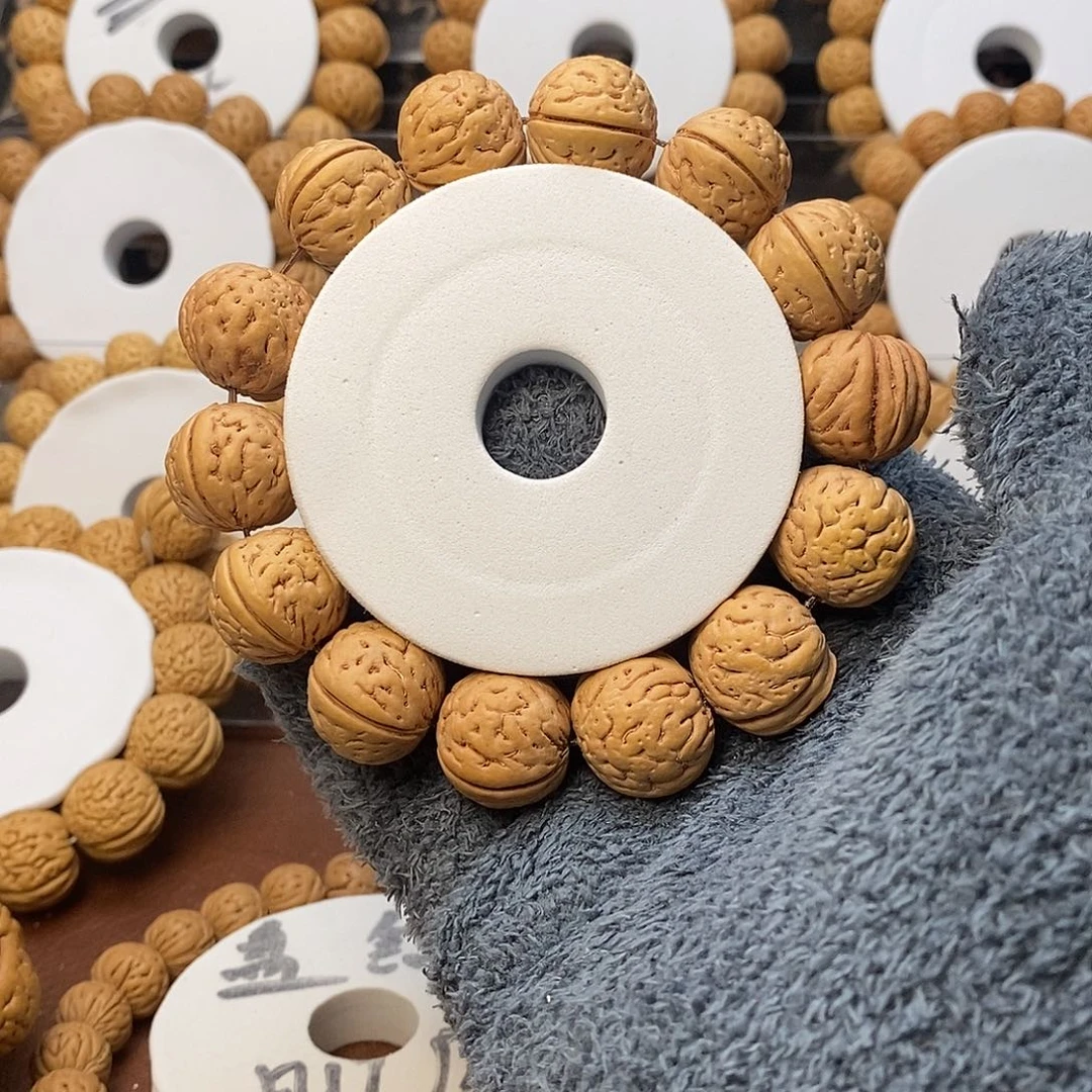 铲***问桃核吊坠盘锦水晶核王肌肉18…