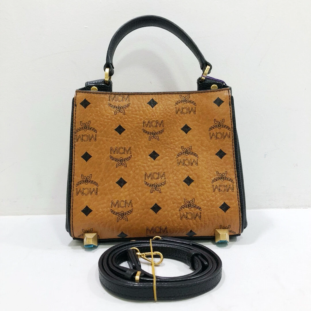 95新 MCM 黑拼干邑色手提单肩斜挎包