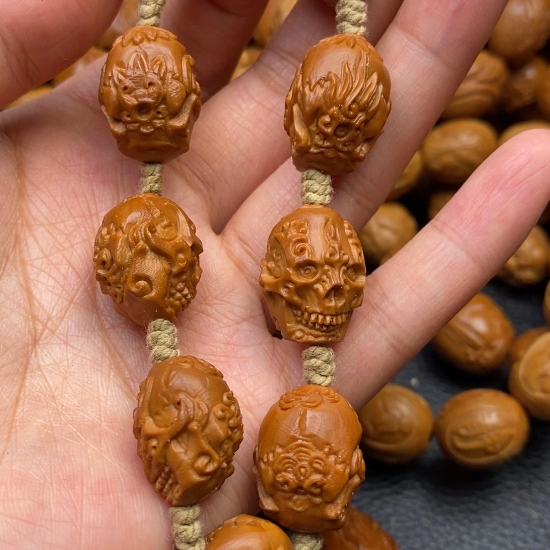 骷***主吊坠橄榄核骷髅头