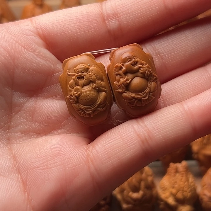 岚***吊坠橄榄核瑕疵的