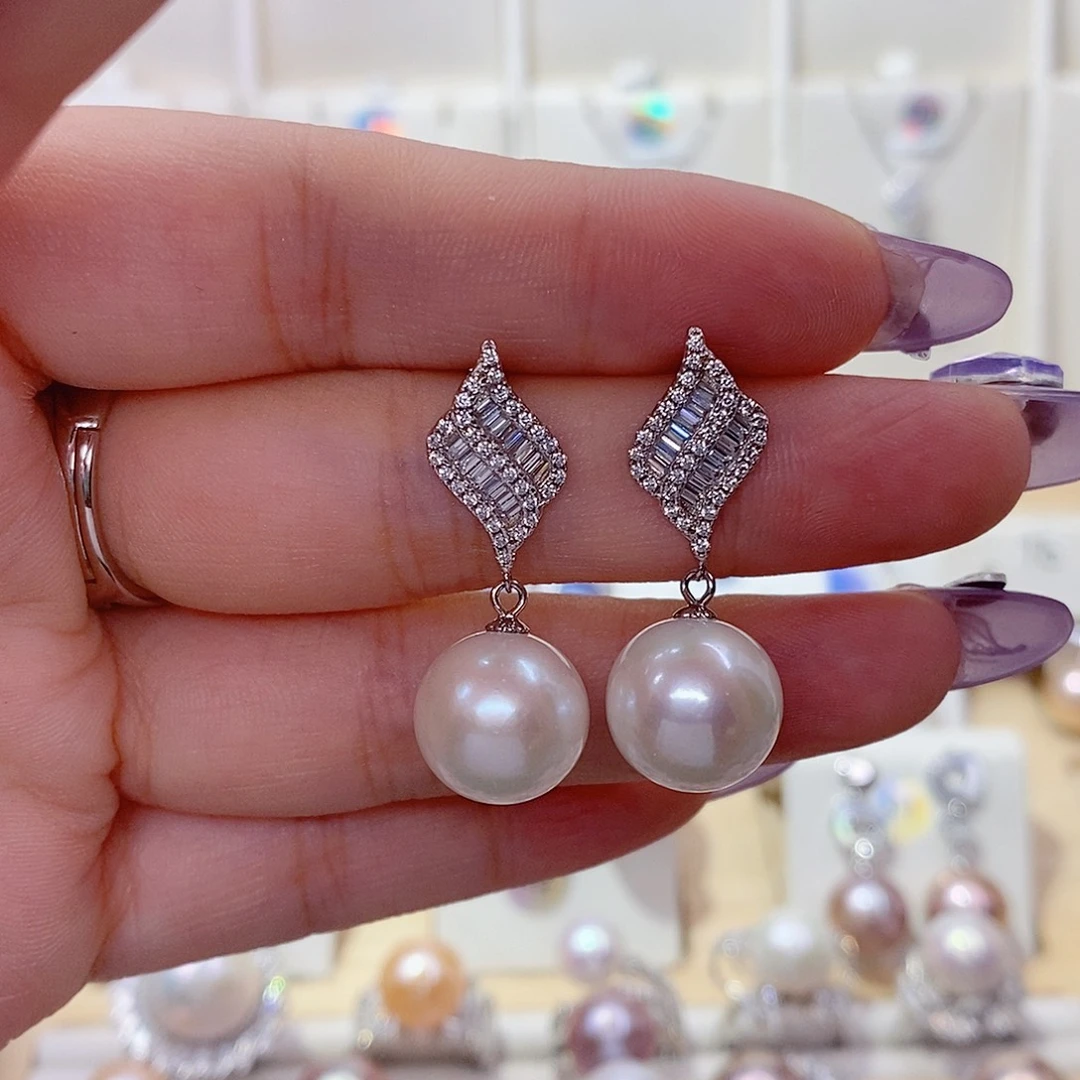 菩***心银S925镶嵌淡水珍珠耳饰