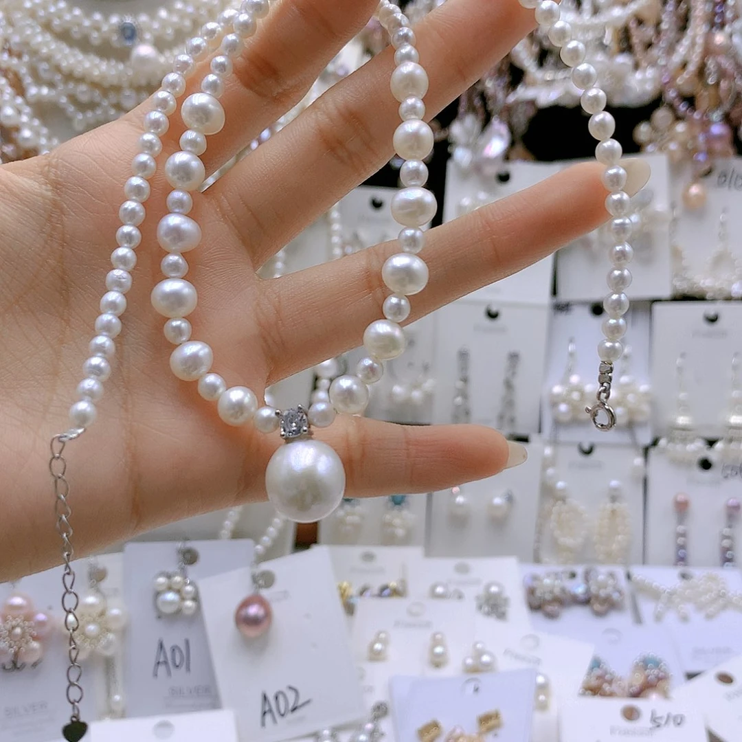 银S925镶嵌耳饰淡水珍珠千*