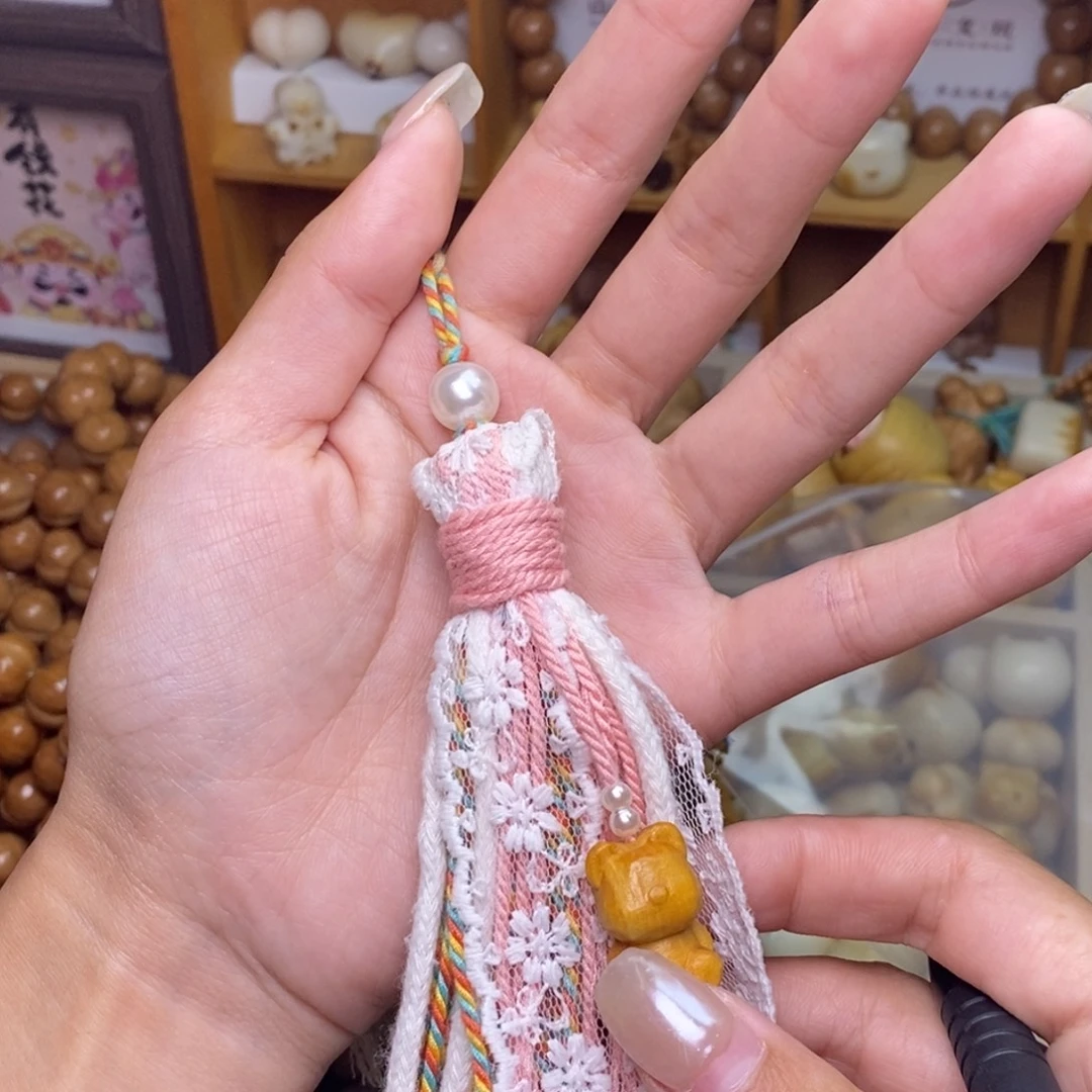 攒****吊坠猴头核桃粉红泡泡流苏