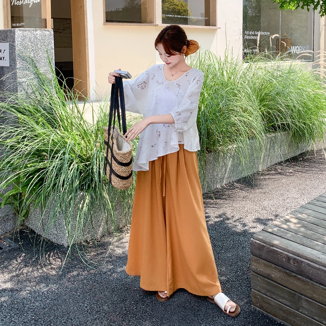 夏季文艺范松弛感穿搭套装裤女设计感镂空不规则上衣阔腿裤两件套