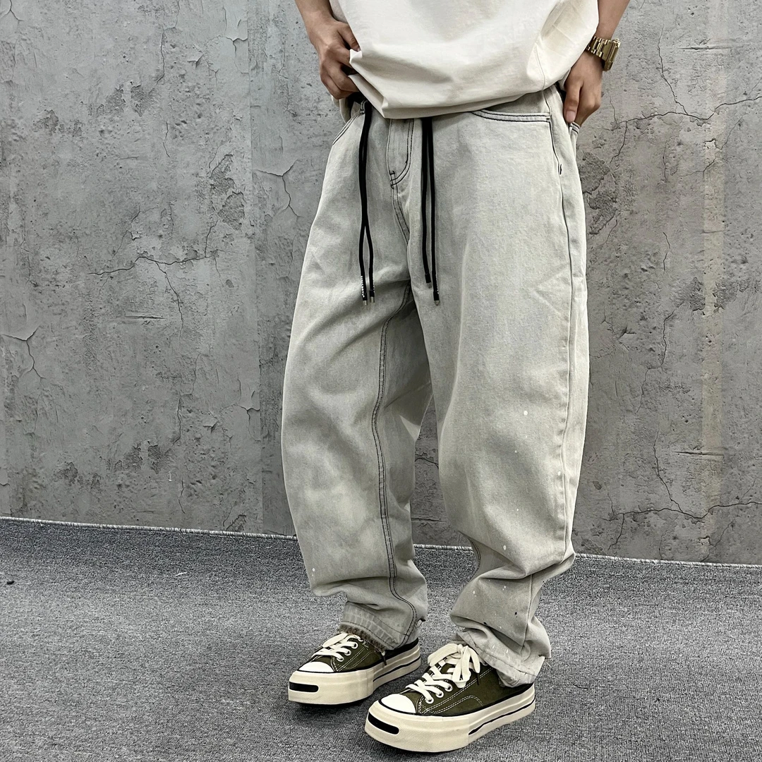 尹小鸡 美式复古重磅水洗裤脚毛边破洞喷漆微锥牛仔裤男女 1018