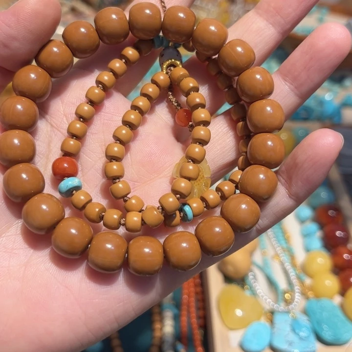 亚***汝手串猴头核桃在一起吗