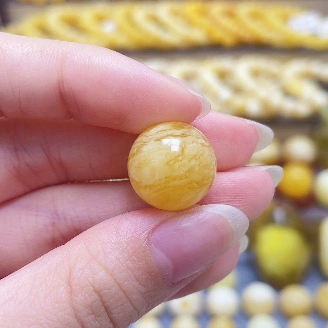 未镶嵌琥珀裸石15.3mm圆珠瑕疵