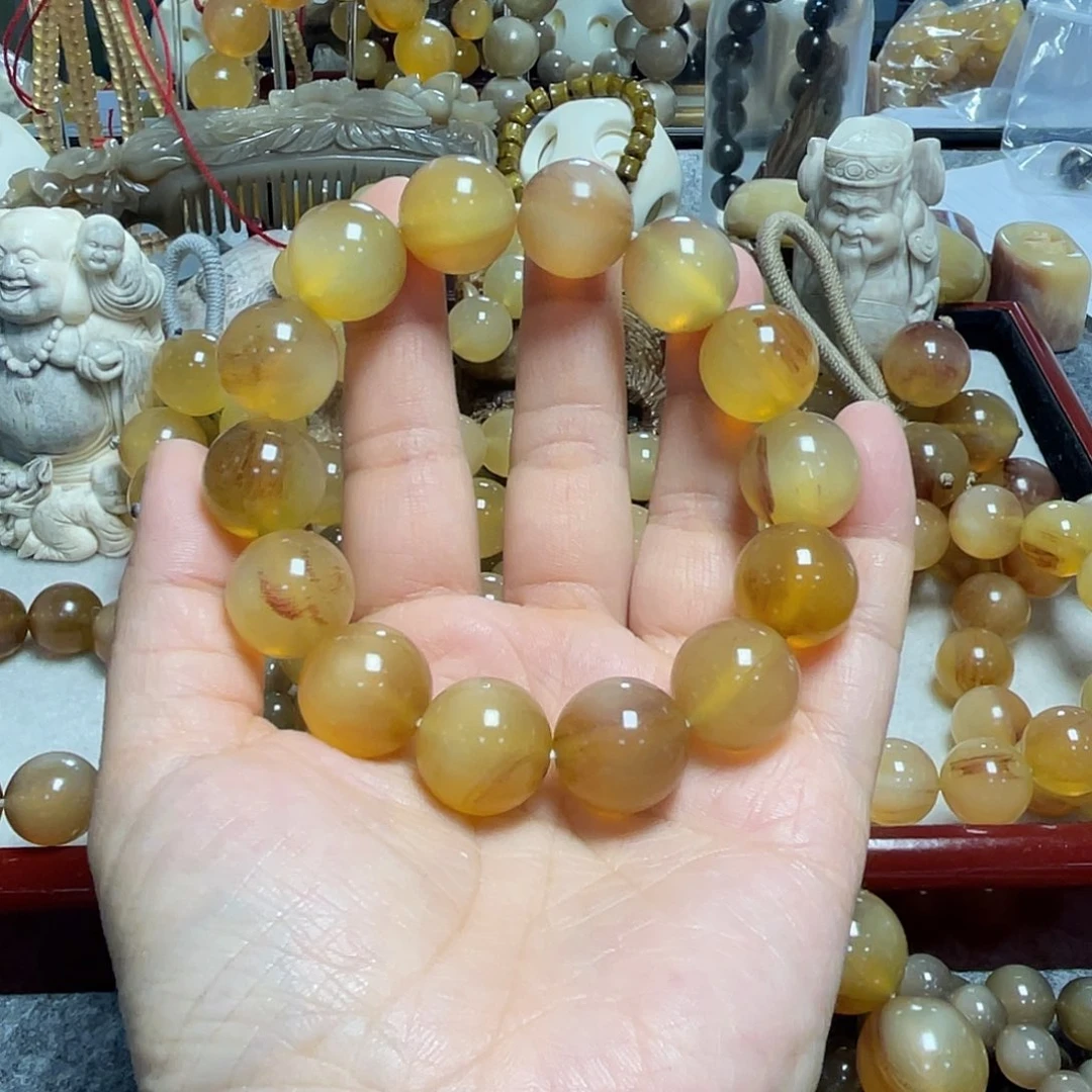 ****熊石英石纯铜1.6带血羊角手串