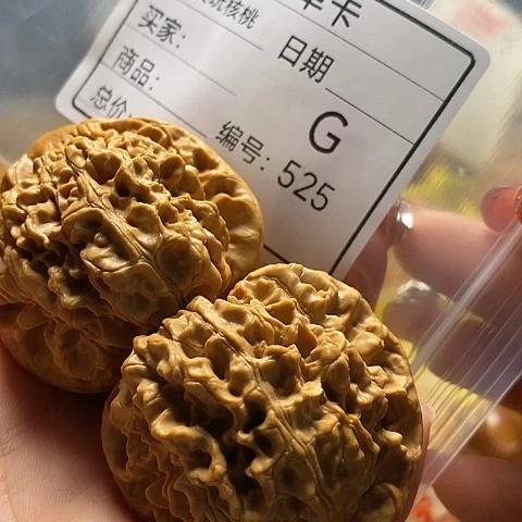 奋***汪桃核吊坠自产自销