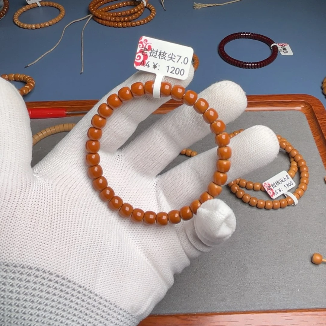 K***D手串橄榄核7.0尺核尖老挝A4