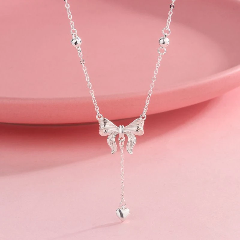 吊坠足银 吊坠足银 纯银项链足银999在逃公主蝴蝶结项链孤品102