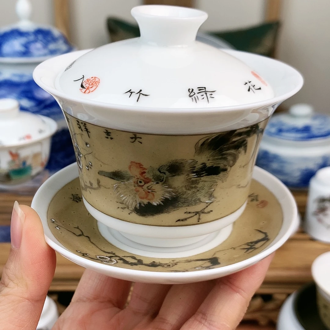 y****i粉彩花鸟手工盖碗