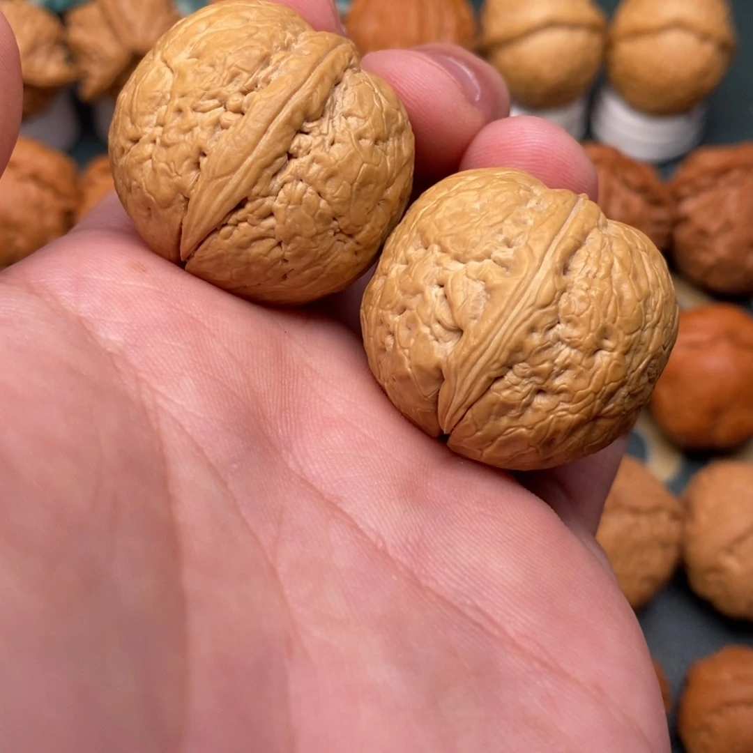 文玩核桃把件蛇皮元宝