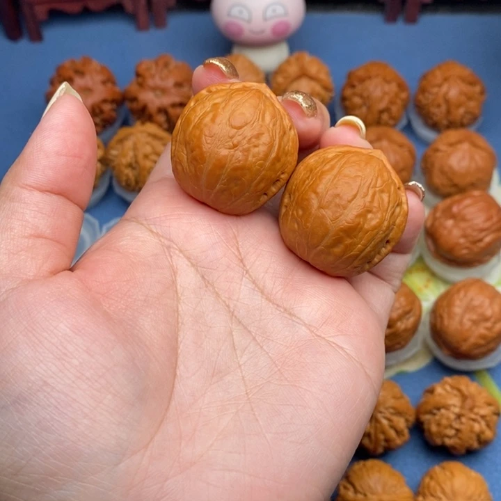 文玩核桃把件我***哥红豆