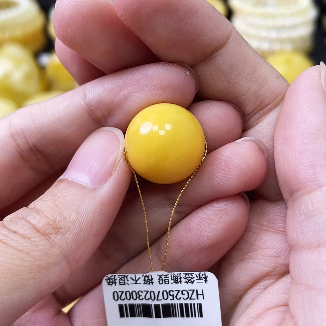 琥珀未镶嵌珠宝奇石鸡油黄浓蜡16.6mm