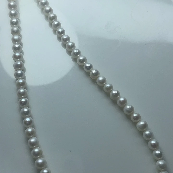 淡水珍珠5左右冷白肉眼正圆未镶嵌