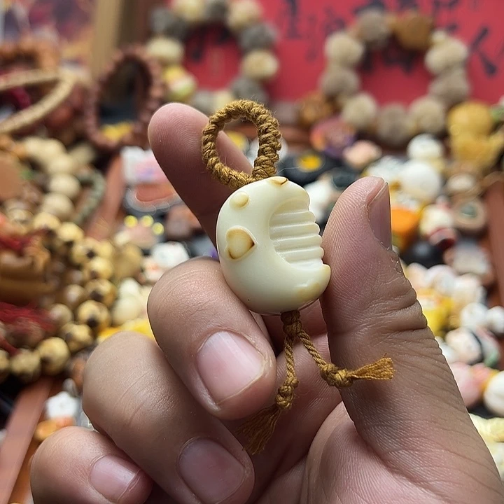 非金属象牙果梳子侧挂滴溜