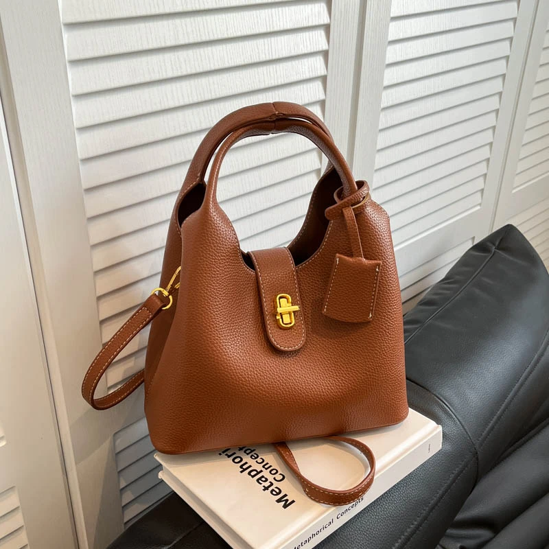 韩风ins慵懒风2025冬季新款女单肩斜挎手提包通勤复古软皮水桶包