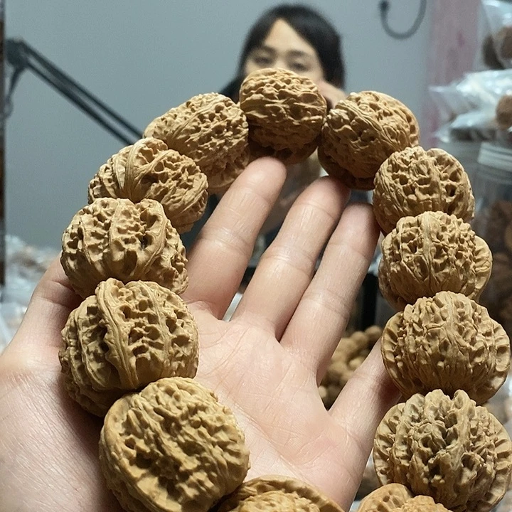 把件文玩核桃36白狮子手持