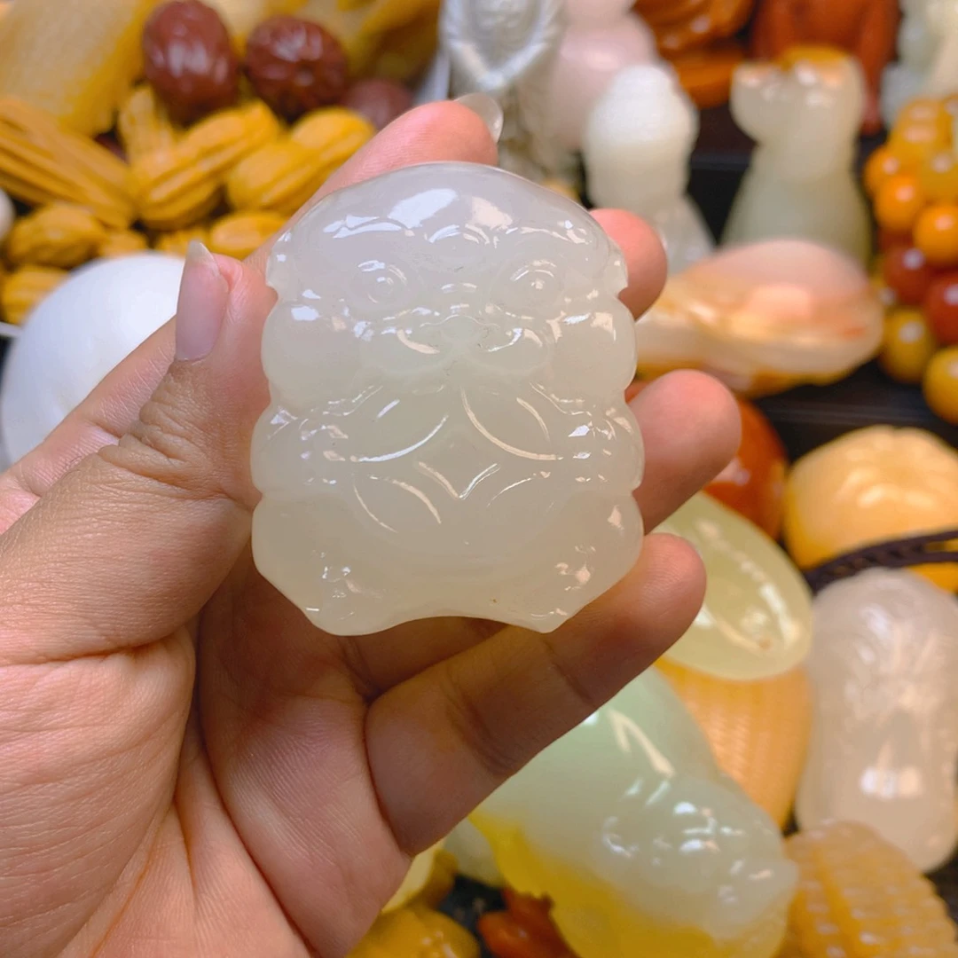 爱****兄新疆五彩石吞金兽