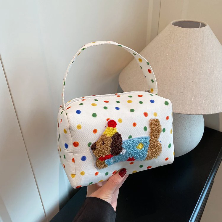 可爱波点小狗化妆包女便携大容量口红护肤品收纳包手提文具笔袋