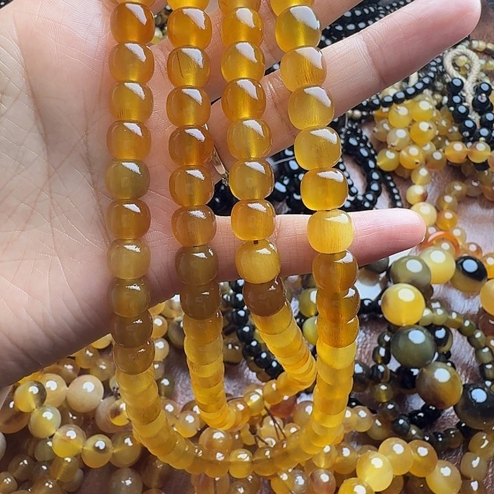 张***.木质类驴蹄子10✖️9蜜色长串