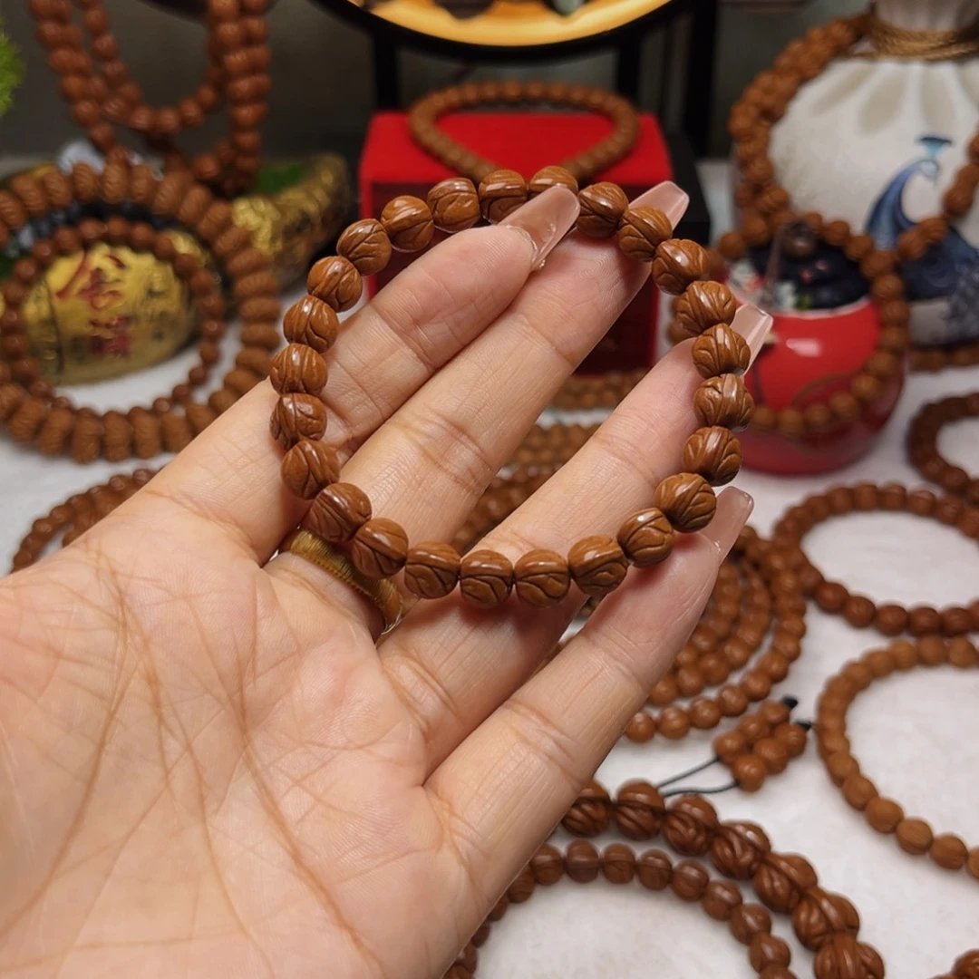 叙***铁桃核吊坠0.9顶级玉龙脊单圈