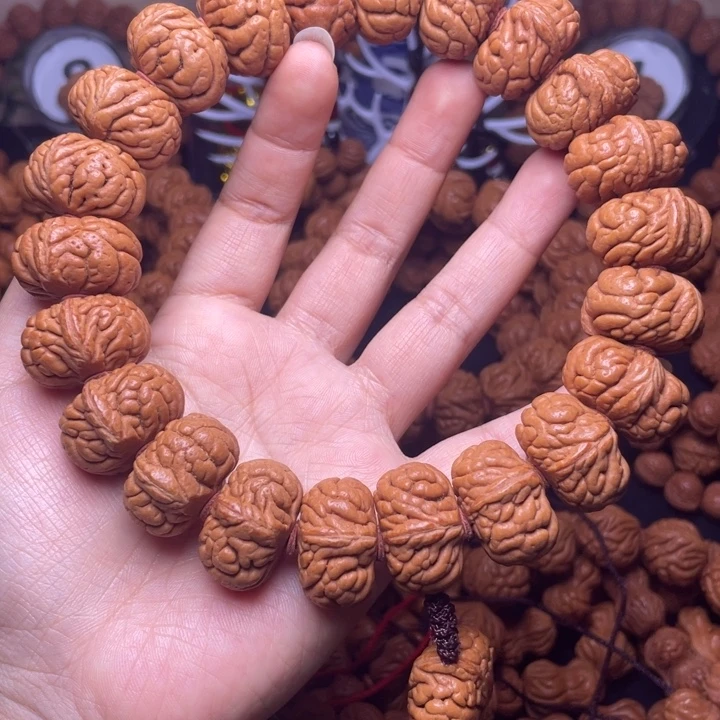 一***然吊坠桃核霸王龙手持