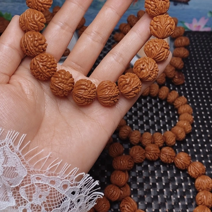 桃核手串酒**逢龙纹桃核