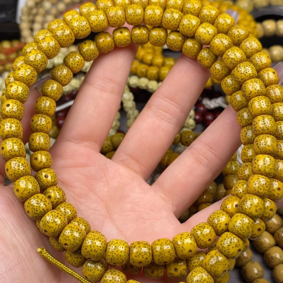 星月菩提吊坠7x8鸡油黄108