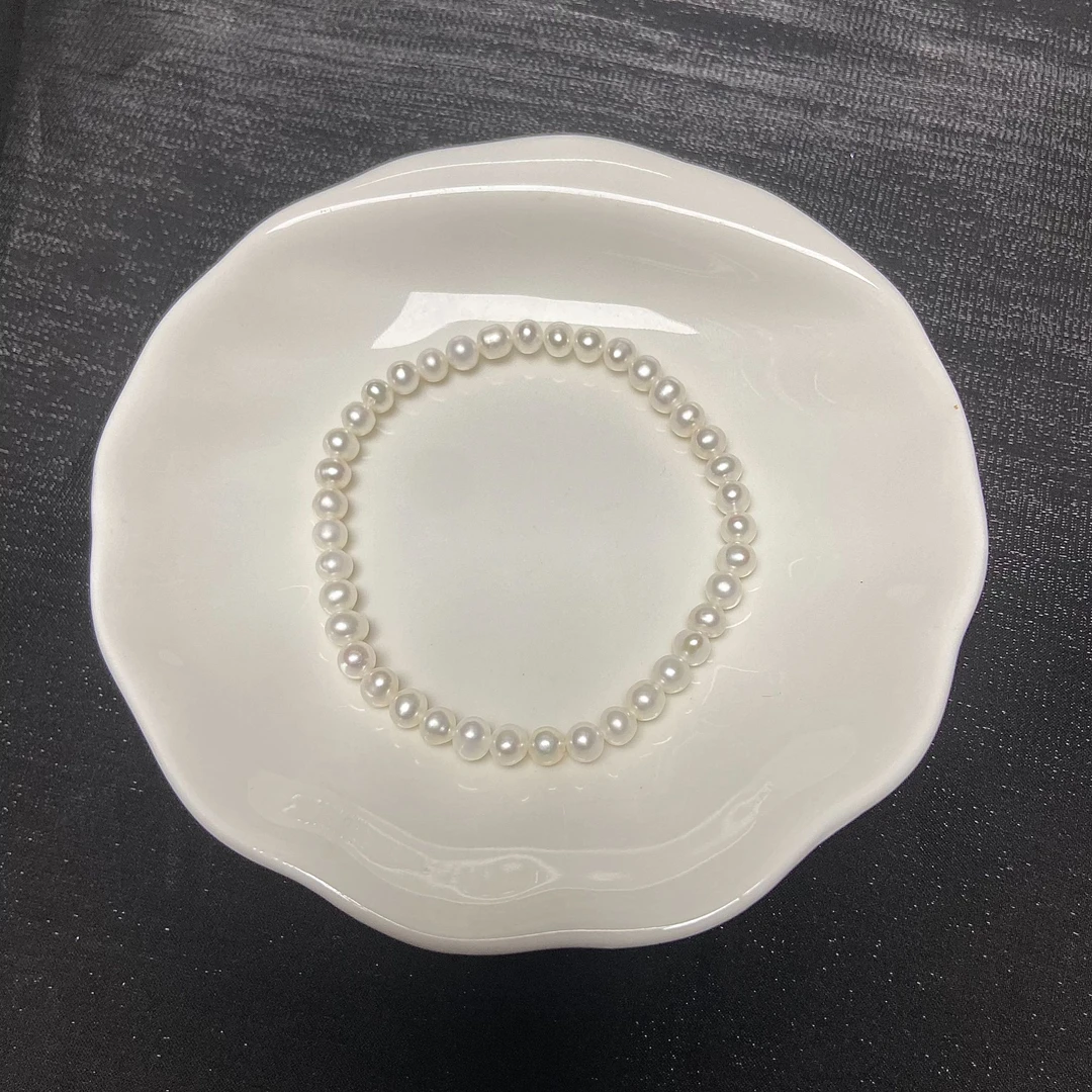 746精品无核近圆4-5mm全珍珠小米珠弹力手链高亮极微瑕总长约17cm