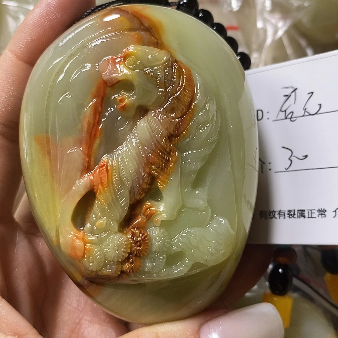 石材君****沙古青石手把件