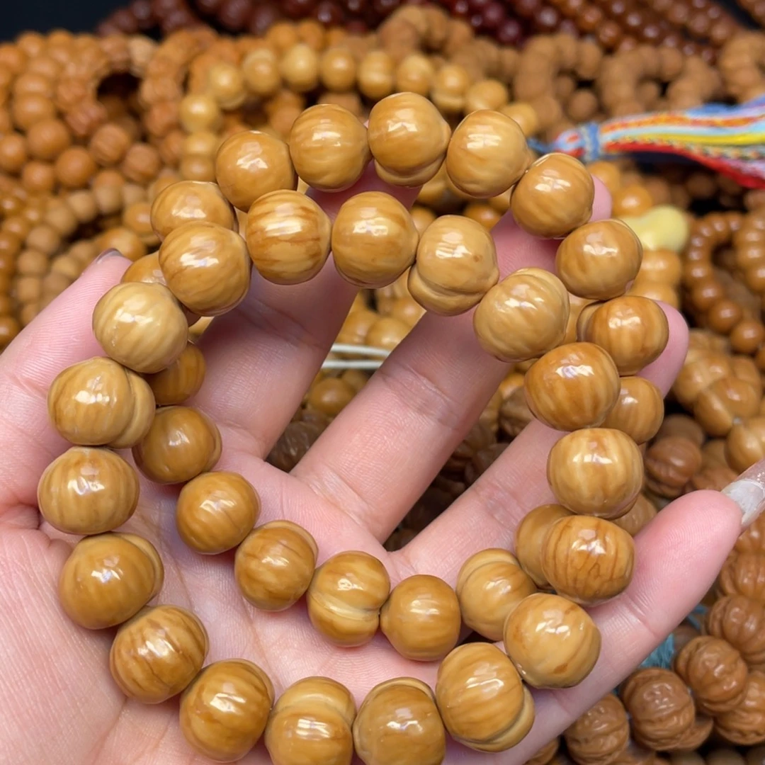 猴头核桃手串微瑕奶油肌屁桃手串