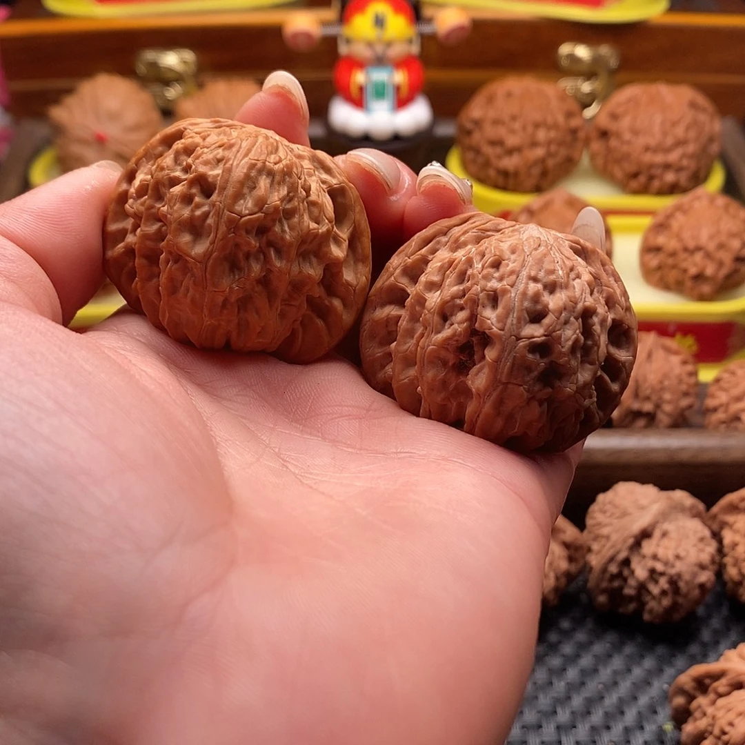 桃核把件麻*浪43全品磨盘。