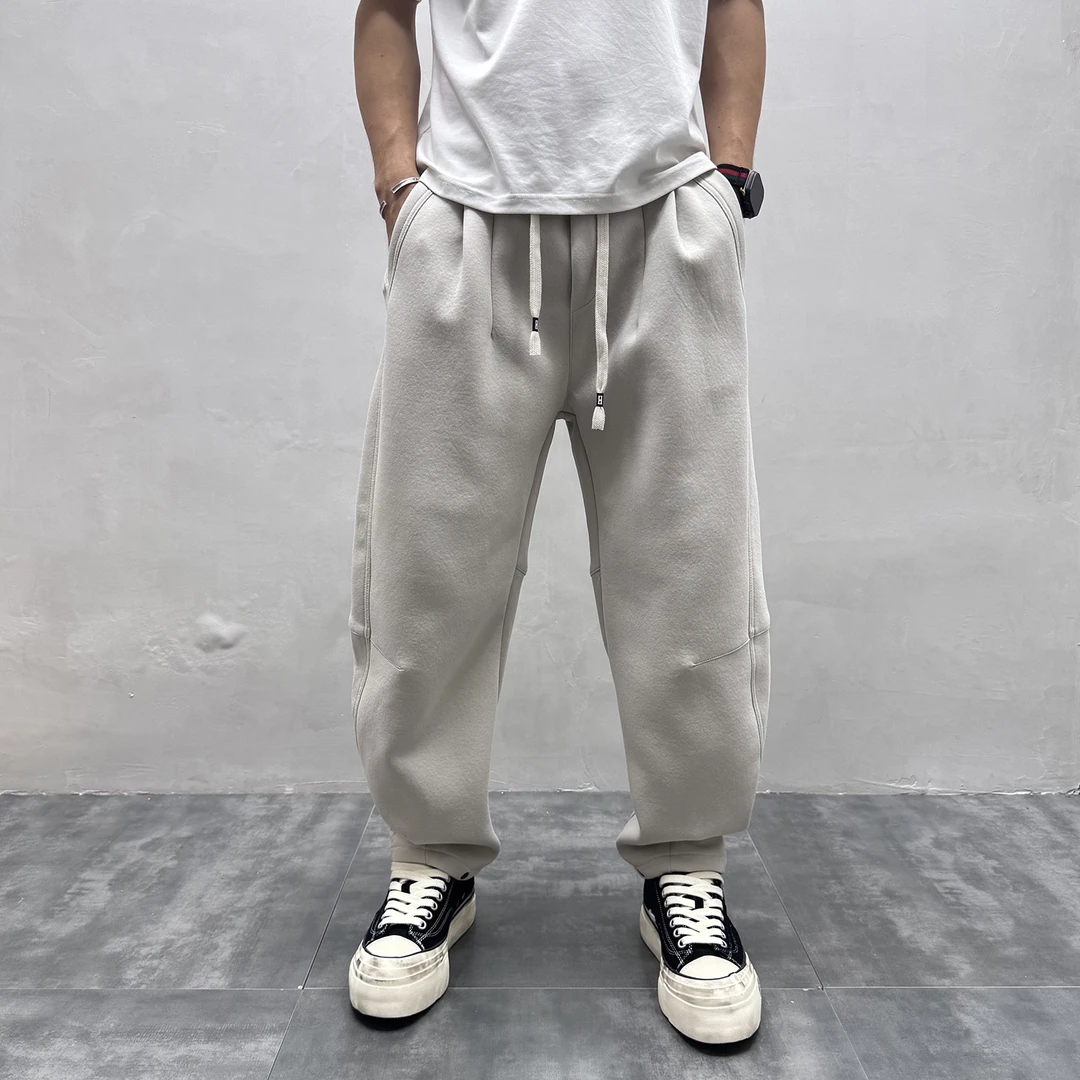 日系简约直筒针织运动卫裤男秋季新款宽松百搭剪裁阔腿弯刀长裤子