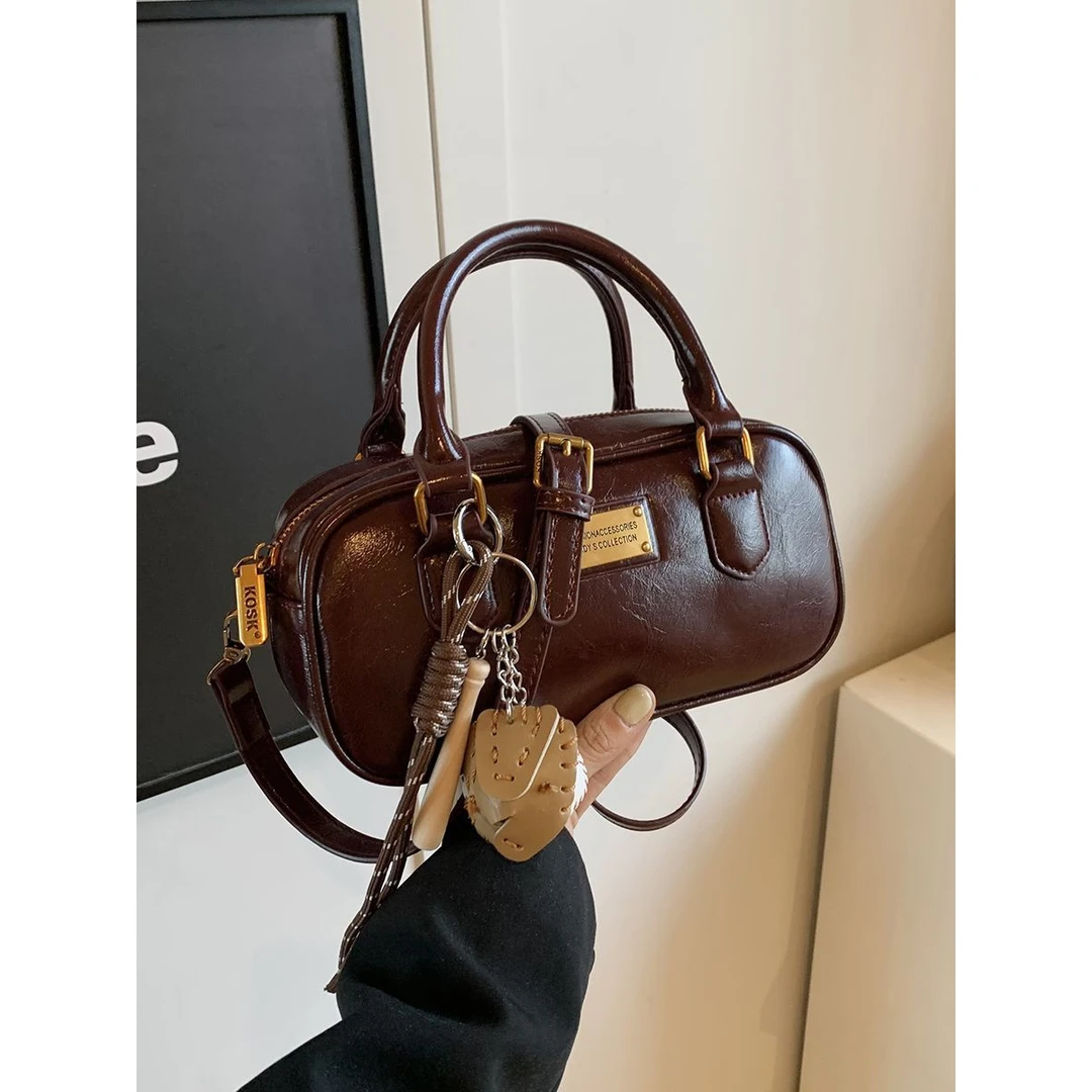 【582人收藏】高级质感小包包女2024秋冬新款手提枕头包波士顿设计