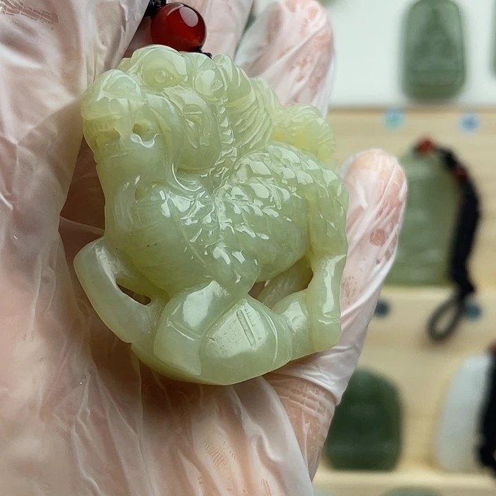 桃***馆双面精雕麒麟吊坠
