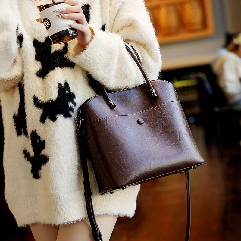 戈兰黛2025新款牛皮女包水桶包时尚百搭单肩包简约百搭女士手提包