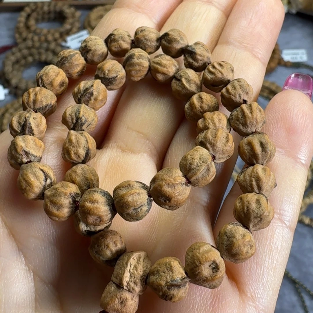 菩提籽类原桩红皮红芽莲花手持