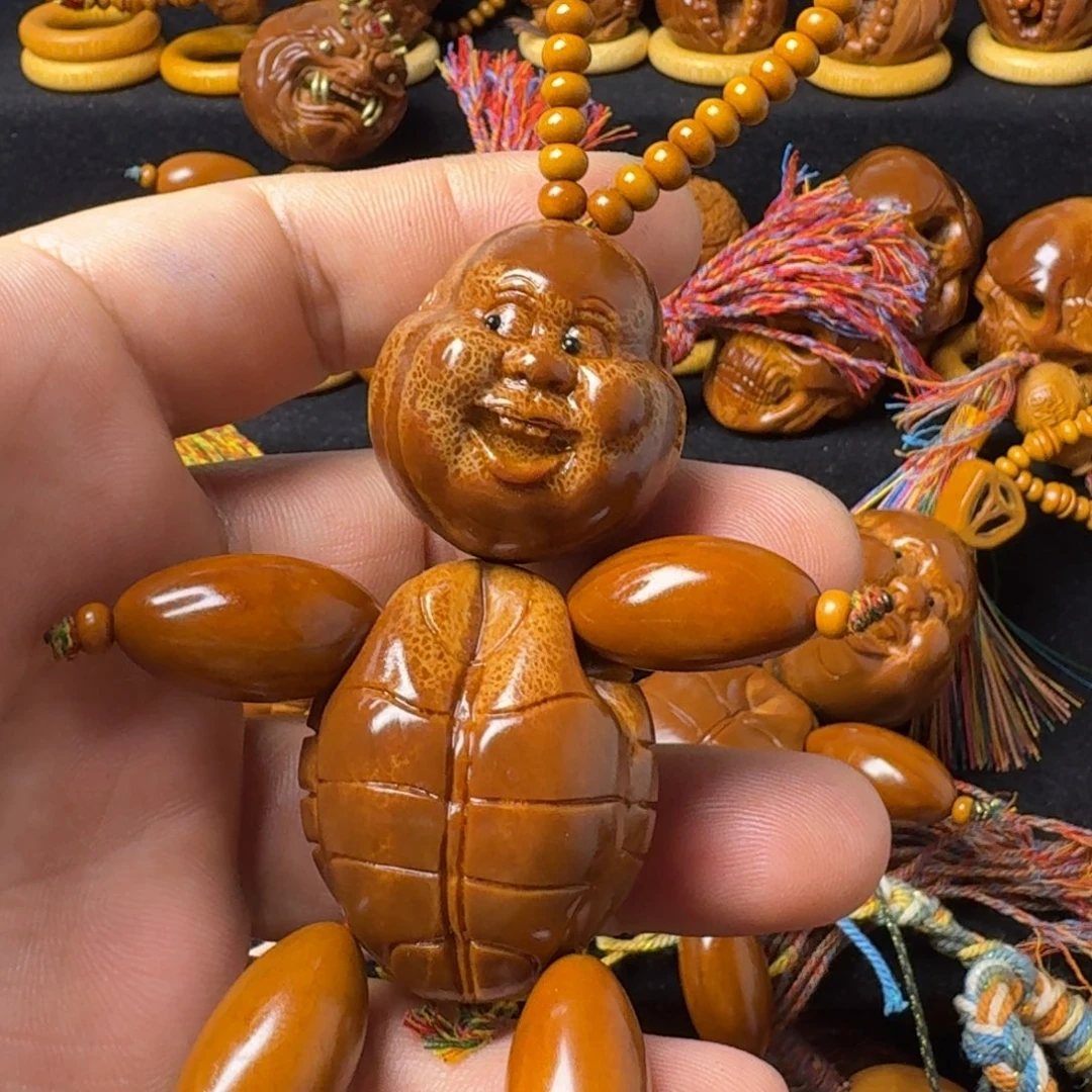 爱****把件橄榄核小富贵