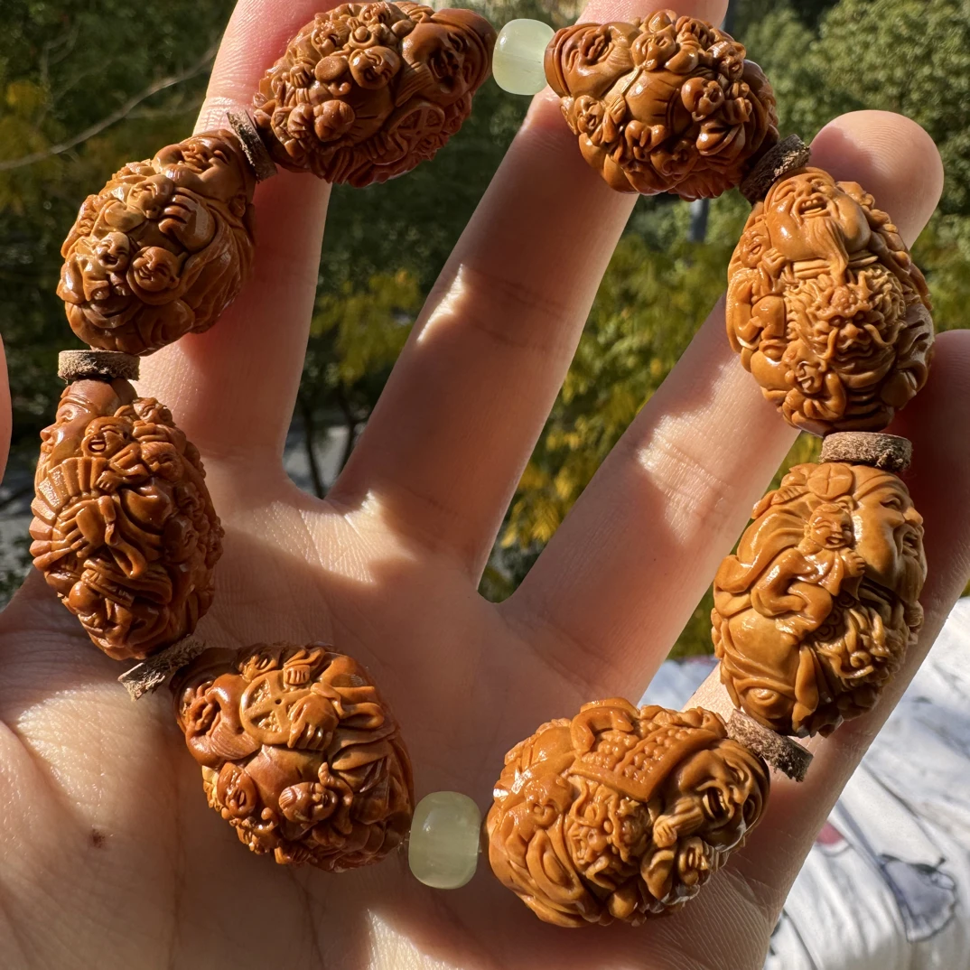 橄榄核核雕尺寸21左右财神手工文玩手串手持挂件精品核雕核质红润