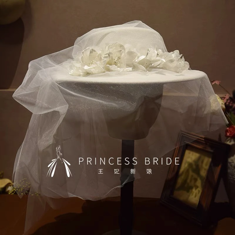 新品2025时尚优雅花朵新娘造型白纱礼帽外景样片连纱蝴蝶结帽子女