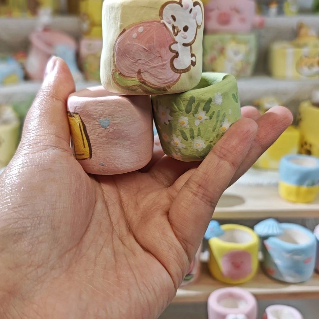 巧***_满29.9包邮手工花盆3个