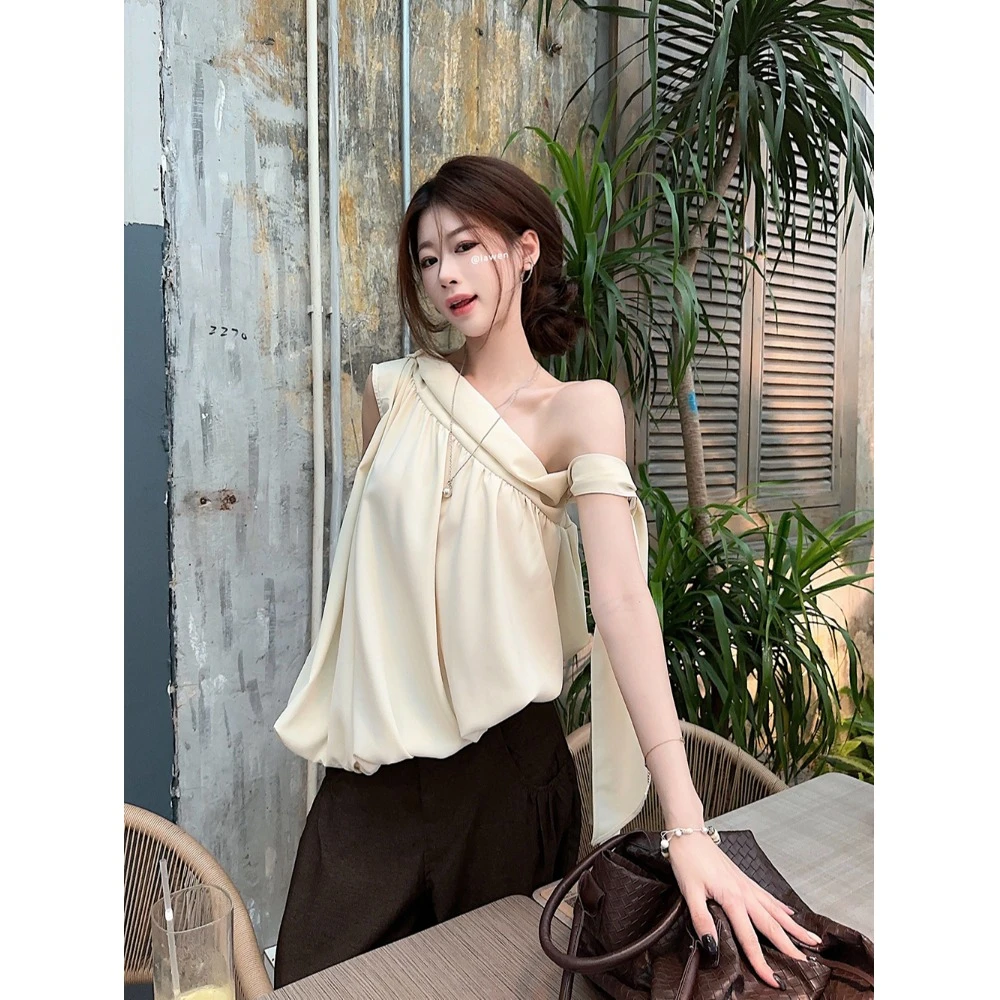 纯欲风飘带斜肩无袖背心女夏季新款法式气质辣妹宽松显瘦花苞上衣