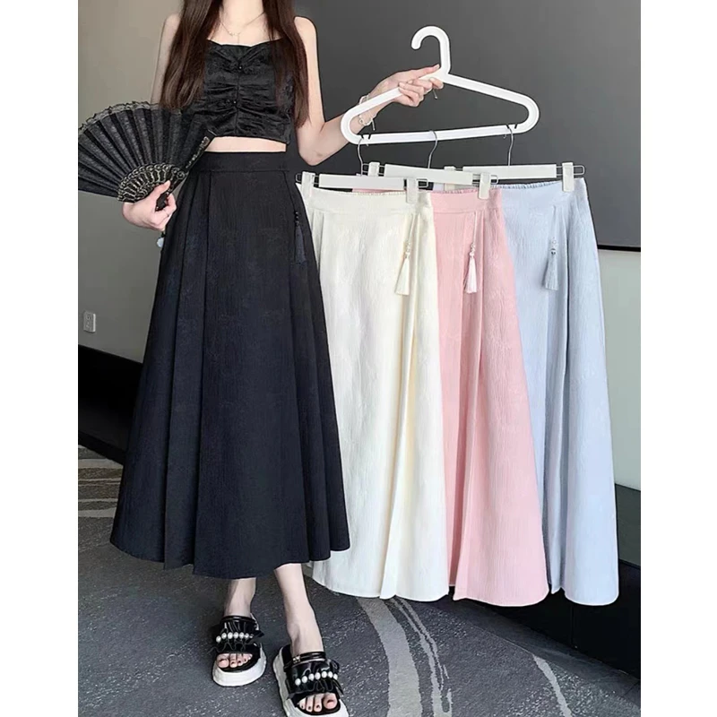 新中式国风提花半身裙女2025新款设计感流苏挂件百搭洋气中长款裙