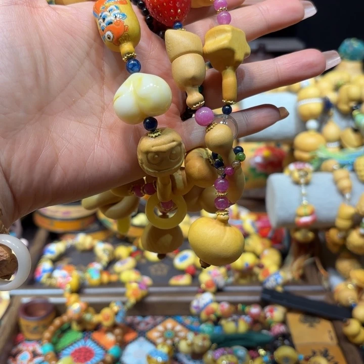 馨***语葫芦脖挂一串多宝